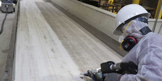 Cleaning equipment in a bakery production facility